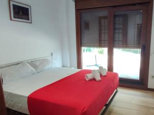 Postel nebo postele na pokoji v ubytování Top Sanxenxo 3000