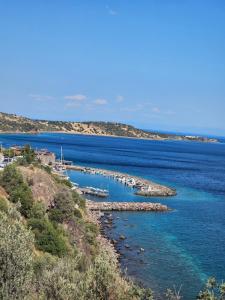 a group of boats in a large body of water at Teora stone otel no 68 in Ayvacık