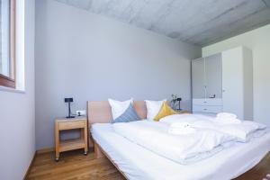 Postel nebo postele na pokoji v ubytování Terrassenwohnung 6