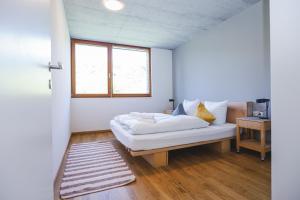 Postel nebo postele na pokoji v ubytování Terrassenwohnung 6