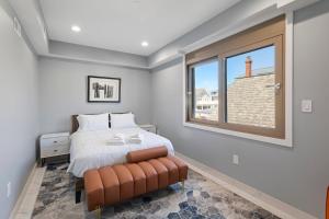 a bedroom with a bed and a window at Ammos Luxury Living- Milos Suite in Ventnor City