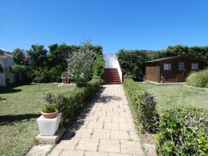 A garden outside Hostal Port Fornells