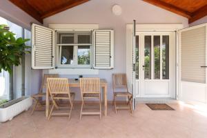 a dining room with a table and chairs at NEW! Apartment in Petrčane 30 meters from the sea - TA Leut Agency in Petrcane