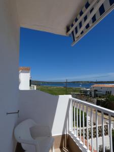 A balcony or terrace at Hostal Port Fornells