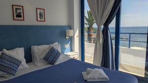 Cama o camas de una habitación en Coral