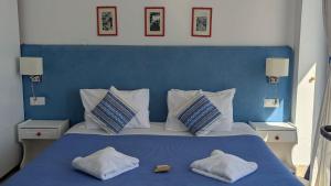 Cama o camas de una habitación en Coral