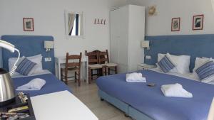 Cama o camas de una habitación en Coral