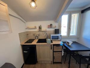 Una cocina o cocineta en Studio