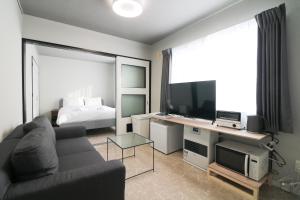 Et tv og/eller underholdning på Maison Odori Higashi Building