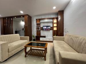 Χώρος καθιστικού στο SK Spacious pent house 1 bhk