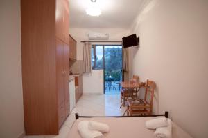 Televízia a/alebo spoločenská miestnosť v ubytovaní Georgias House