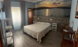Posteľ alebo postele v izbe v ubytovaní Hostal imperio