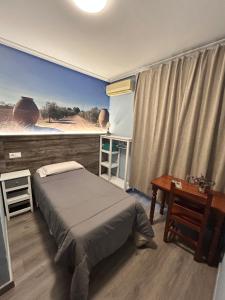Posteľ alebo postele v izbe v ubytovaní Hostal imperio