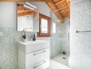 a bathroom with a white sink and a shower at Biennale Palace R&R in Venice +87 photos