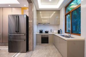 Fotografie z fotogalerie ubytování 三亚亮庭观棠独享别墅 v destinaci San-ja + 34 fotografií