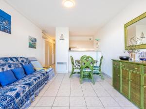 Posedenie v ubytovaní Spacieux 44m² climatisé avec terrasse, 2 pièces, cabine, Wifi, proche plage - FR-1-472A-266
