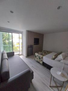 TV a/nebo společenská místnost v ubytování Hotel Mediterraneo