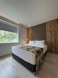 Postel nebo postele na pokoji v ubytování Hotel Mediterraneo