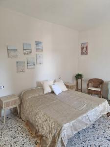 Ένα ή περισσότερα κρεβάτια σε δωμάτιο στο Casa Vacanza L'Orchidea