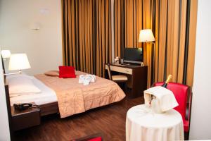 Letto o letti in una camera di Gullo Hotel