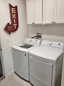 a laundry room with a washer and dryer at 3 Bedroom 2 Bath Designer in The Villages