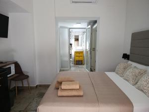 Łóżko lub łóżka w pokoju w obiekcie Casa Vladimir