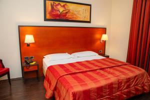Letto o letti in una camera di Gullo Hotel