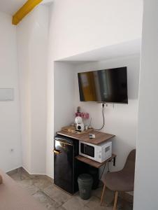 Telewizja i/lub zestaw kina domowego w obiekcie Casa Vladimir