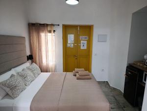 Łóżko lub łóżka w pokoju w obiekcie Casa Vladimir
