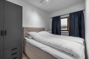 Ένα ή περισσότερα κρεβάτια σε δωμάτιο στο The Arctic Hideout