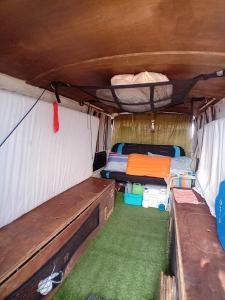 an inside view of a camper with a bed in it at Vintage Camper Van Explore Driving Mallorca - full equip in Palma de Mallorca