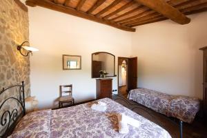 Postel nebo postele na pokoji v ubytování Casa Elisabetta