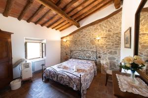 Postel nebo postele na pokoji v ubytování Casa Elisabetta