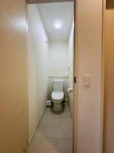 Koupelna v ubytování 福の荘 空港2号棟