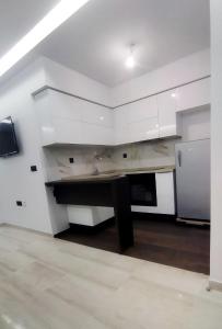 Kuchyň nebo kuchyňský kout v ubytování Appartement cosy avec accès piscine