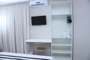 TV a/nebo společenská místnost v ubytování Ventura Hotel