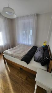 Postel nebo postele na pokoji v ubytování Peace Bear Residence, self check-in