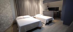 Postel nebo postele na pokoji v ubytování Hotel Mediterraneo