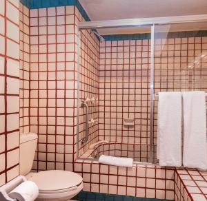Ванная комната в Solmar Resort