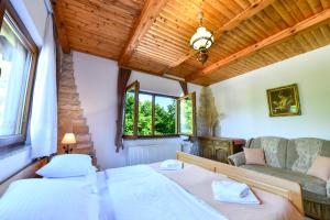 Postel nebo postele na pokoji v ubytování Apartments Bramado + 37 fotografií