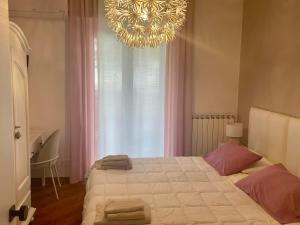 Łóżko lub łóżka w pokoju w obiekcie Bed & Breakfast con vista giardino e piscina