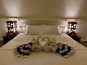 Ένα ή περισσότερα κρεβάτια σε δωμάτιο στο Gili Island Bungalow