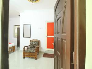 Galería fotográfica de JMS Brahmin Guest House Thirunallar en Tirunallār