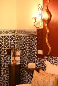 Postel nebo postele na pokoji v ubytování Riad Nouceiba Marrakech