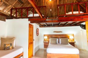 Postel nebo postele na pokoji v ubytování Hotel Isla del Sol + 37 fotografií