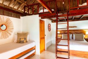 Postel nebo postele na pokoji v ubytování Hotel Isla del Sol