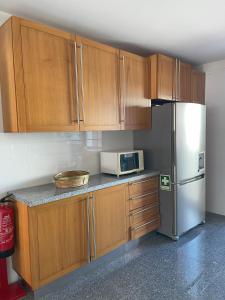 Η κουζίνα ή μικρή κουζίνα στο Marina Residence - Costa Nova +18 φωτογραφίες