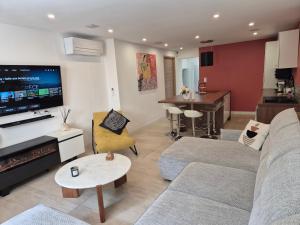 Posezení v ubytování Magnifique appartement 2 chambres avec 50 m2 de jardin privatif