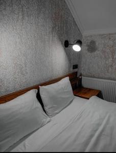 Rúm í herbergi á Toliketi Kazbegi