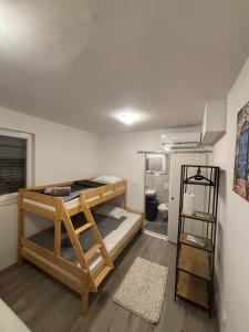 Postel nebo postele na pokoji v ubytování Apartman Rita